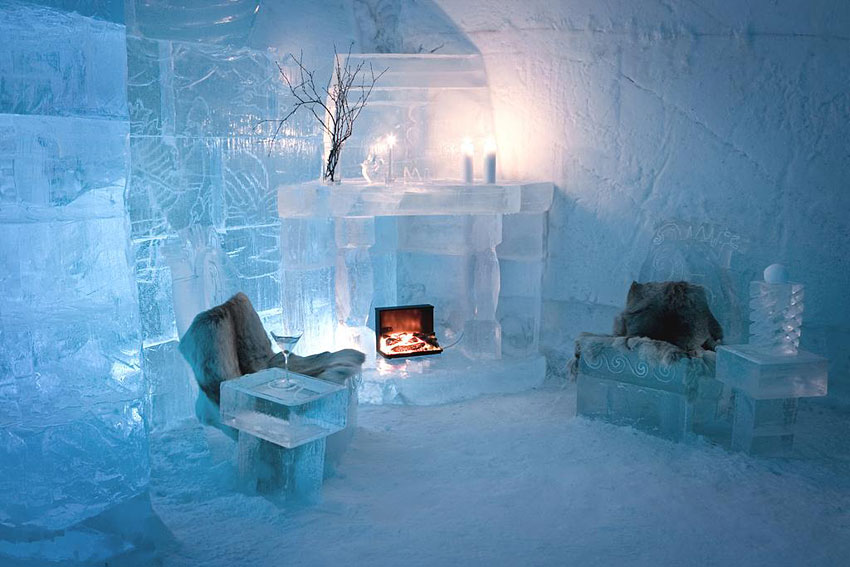 Carved ice wall behind a low bed platform in a hall of ice
